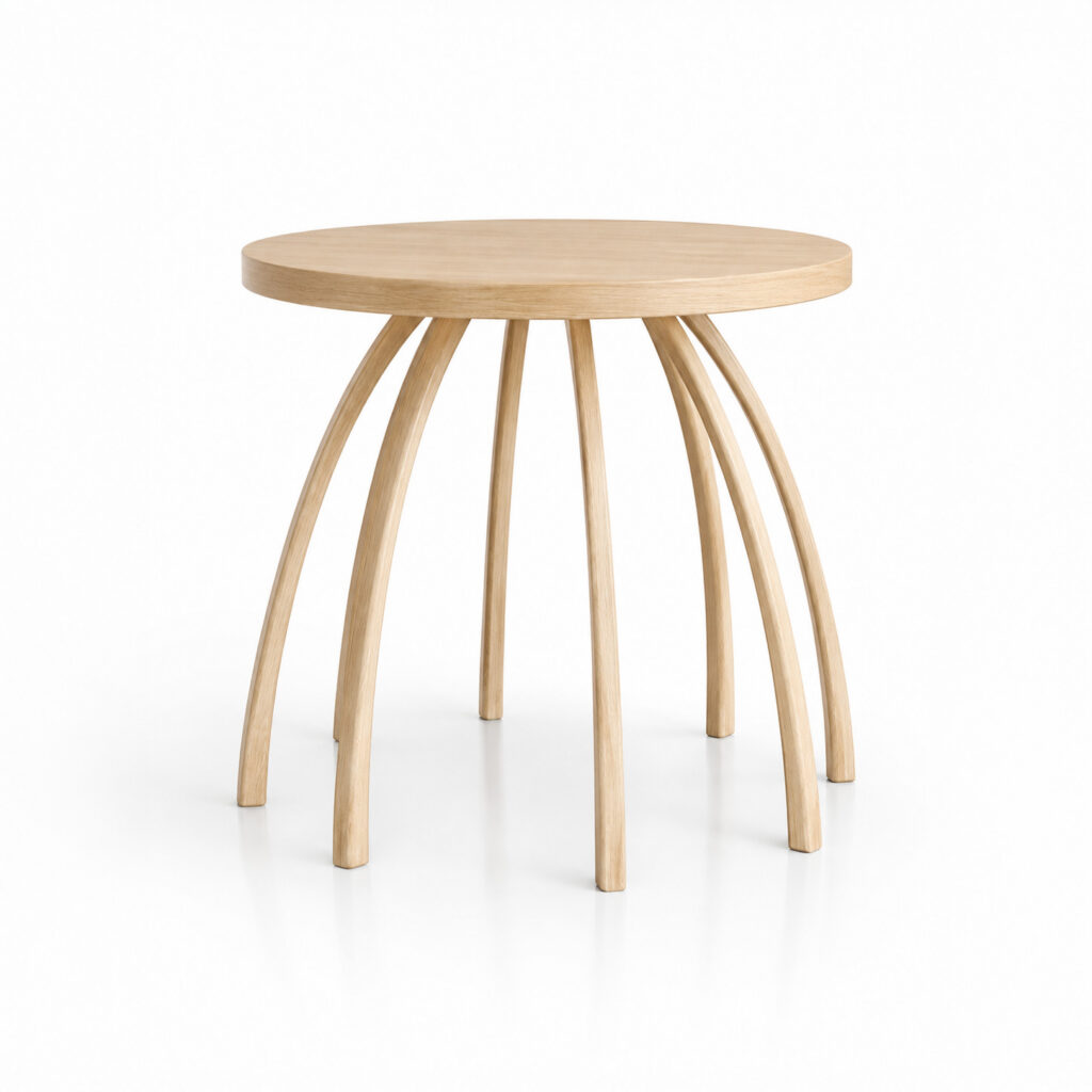 Round TARANTEL coffee table made of light wood with characteristic curved legs, diameter 53 cm, height 41 cm, photographed on a white background.
