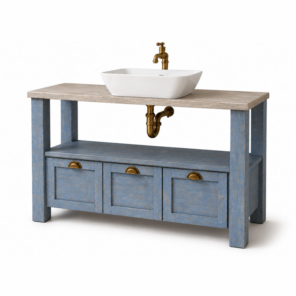 Antique-style bathroom vanity in distressed light blue wood with three drawers, brass cup handles, a light stone countertop, glossy white ceramic vessel basin and brass faucet.