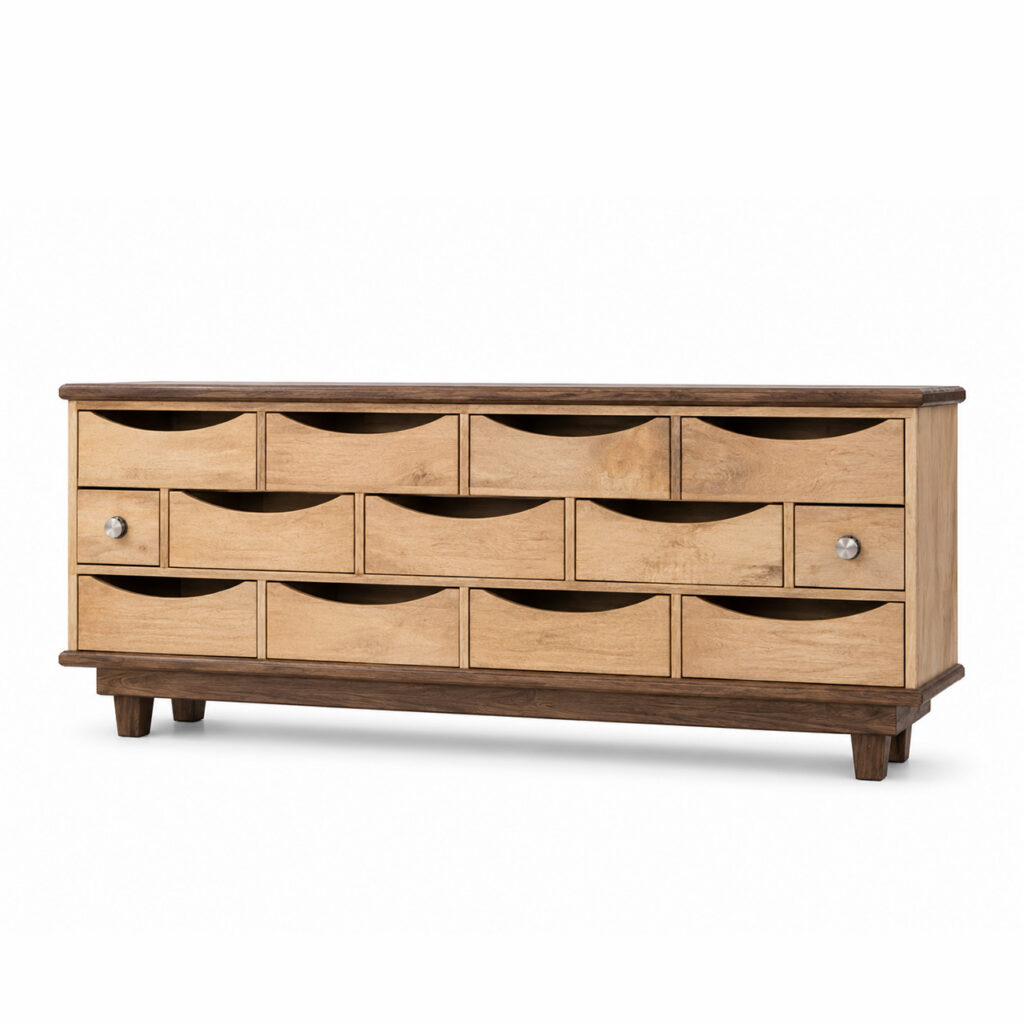 Low multi-drawer sideboard in light mango wood with a dark oak top and base, brushed stainless steel handles and curved drawer cut-outs, shown on a white background.