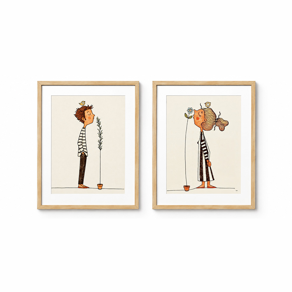 Set of two Scandinavian framed wall prints with whimsical illustrated figures, light wood frames and white mat boards on a white background.